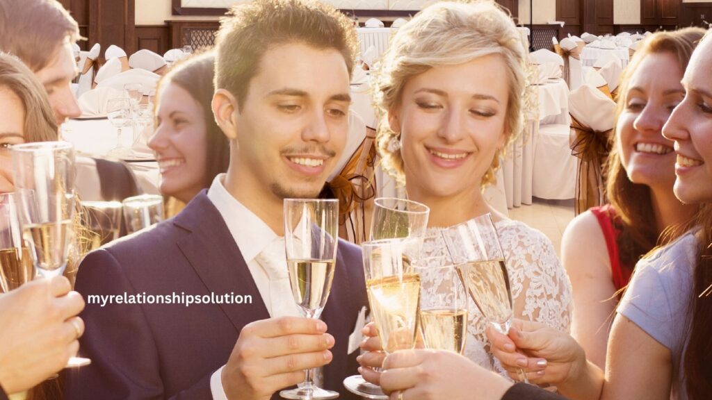 Wedding guests with bride and groom