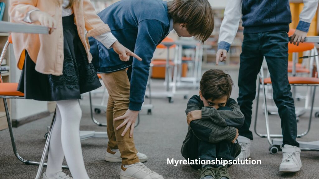 A child being bullied by other students in school