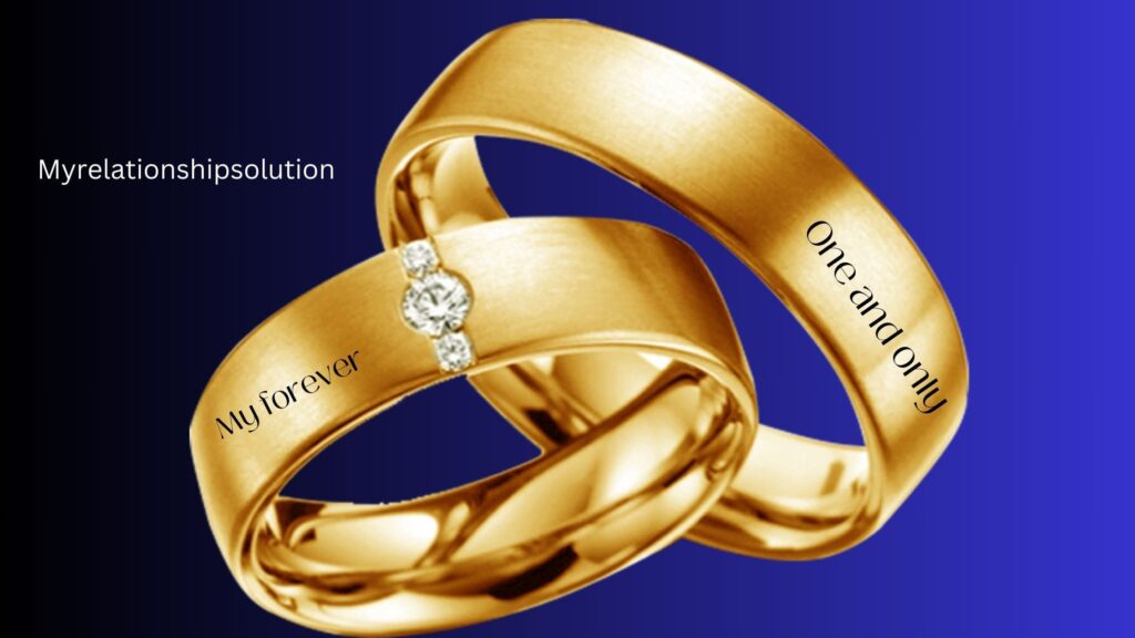 Two wedding rings engraved with romantic text